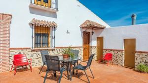 A balcony or terrace at Casa Mari de Almogia by Ruralidays