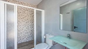 A bathroom at Casa Mari de Almogia by Ruralidays