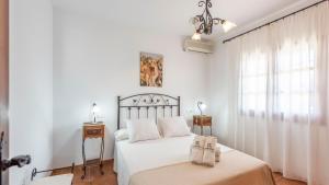 Ein Bett oder Betten in einem Zimmer der Unterkunft Villa Belen Torrox by Ruralidays
