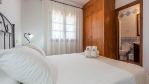 Ein Bett oder Betten in einem Zimmer der Unterkunft Villa Belen Torrox by Ruralidays