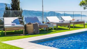 Der Swimmingpool an oder in der Nähe von Villa Belen Torrox by Ruralidays