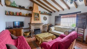 O zonă de relaxare la Casa Lagar El Mirador Almachar by Ruralidays