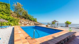 Bazén v ubytování Villa Eugenia Torrox by Ruralidays nebo v jeho okolí