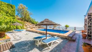 Bazén v ubytování Villa Eugenia Torrox by Ruralidays nebo v jeho okolí