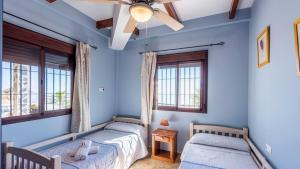 Postel nebo postele na pokoji v ubytování Villa Eugenia Torrox by Ruralidays
