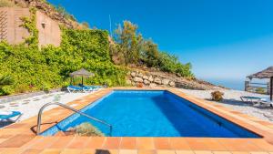 Bazén v ubytování Villa Eugenia Torrox by Ruralidays nebo v jeho okolí