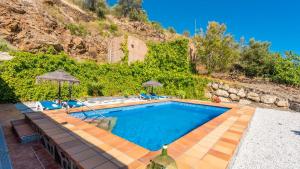 Bazén v ubytování Villa Eugenia Torrox by Ruralidays nebo v jeho okolí