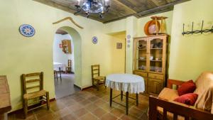 A seating area at Casa Rural Azahar Periana by Ruralidays