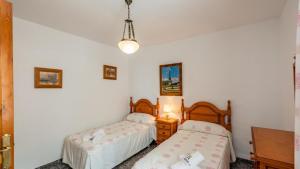 Posteľ alebo postele v izbe v ubytovaní Casa Leo Frigiliana by Ruralidays