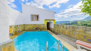 Bazén v ubytování Casa El Limon Gaucin by Ruralidays nebo v jeho okolí