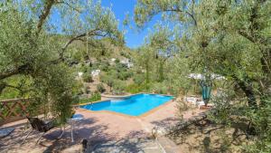 Der Swimmingpool an oder in der Nähe von Finca Colores en el Viento Frigiliana by Ruralidays