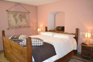 A bed or beds in a room at maison terme relax