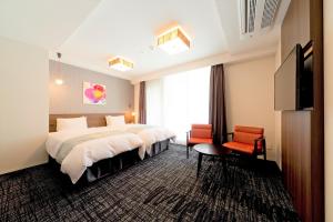 Postel nebo postele na pokoji v ubytování Hotel Gran Ms Kyoto