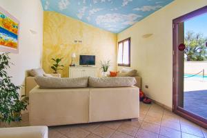 Posezení v ubytování Hotel La Perla