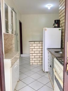 Kuchyň nebo kuchyňský kout v ubytování Residencial e Pousada Acauan