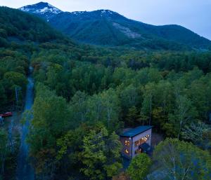 a tree house in the middle of a forest at Forest Hideaway in Niseko