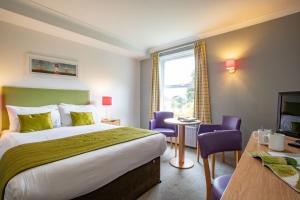 Voodi või voodid majutusasutuse George Hotel toas
