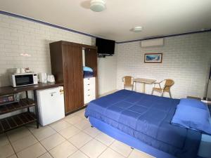 Kuchyň nebo kuchyňský kout v ubytování Grand Hotel Motel