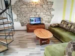 TV a/nebo společenská místnost v ubytování App Isabel