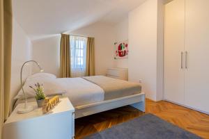 Postel nebo postele na pokoji v ubytování House Catania