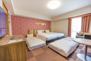 Tabino Hotel lit Matsumoto Milky white Onsenにあるベッド
