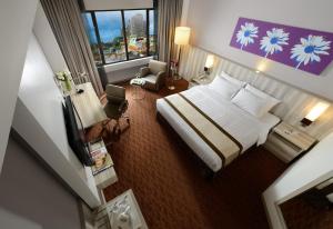 Postel nebo postele na pokoji v ubytování Sunway Hotel Georgetown Penang
