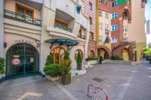 a street in front of a building at Corvin Hotel Budapest Sissi Wing in Budapest