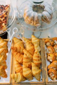 a display of pastries and other pastries on a table at Park Hyatt Vienna in Vienna