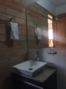 Ένα μπάνιο στο Refugio Villa Emilio