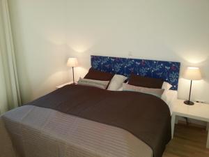 Ένα ή περισσότερα κρεβάτια σε δωμάτιο στο Ferienhaus Emstal in Oberlangen