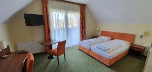 Postel nebo postele na pokoji v ubytování Hotel Angerer-Hof + 37 fotografií