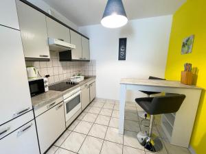 Kuchyň nebo kuchyňský kout v ubytování Apartman Zlata