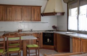 A kitchen or kitchenette at B&B A Un Passo Da