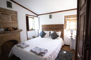 Uma cama ou camas num quarto em Casa da Cerca
