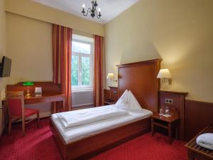 Postel nebo postele na pokoji v ubytování Hotel Marienhof + 33 fotografií