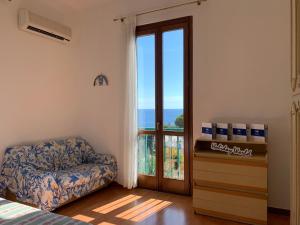 Posteľ alebo postele v izbe v ubytovaní House Sole e Mare by Holiday World