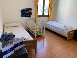 Posteľ alebo postele v izbe v ubytovaní House Sole e Mare by Holiday World