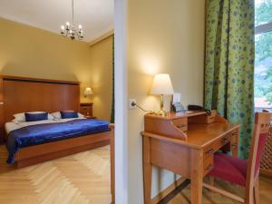 Postel nebo postele na pokoji v ubytování Hotel Marienhof