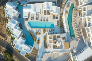 an aerial view of a resort with a pool at Secret View Hotel in Oia