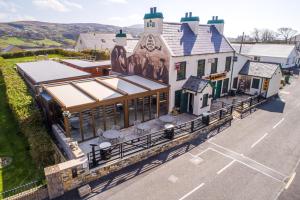 an aerial view of a building with a train station at The Rusty Mackerel in Teelin