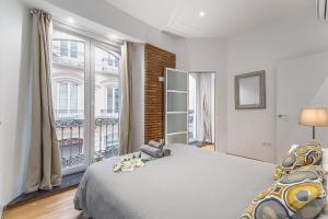 Posteľ alebo postele v izbe v ubytovaní Exclusive Luxury Stay at Plaza Uncibay, Málaga Center
