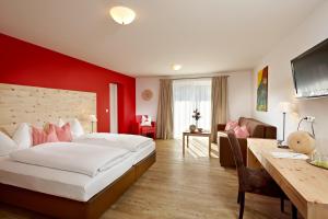 Postel nebo postele na pokoji v ubytování Hotel Steiger + 37 fotografií