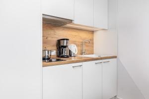 Kuchyňa alebo kuchynka v ubytovaní Seaside Park Private Apartment by Noclegi Renters