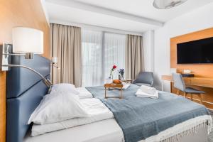 Posteľ alebo postele v izbe v ubytovaní Seaside Park Private Apartment by Noclegi Renters
