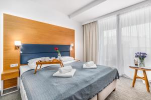Posteľ alebo postele v izbe v ubytovaní Seaside Park Private Apartment by Noclegi Renters