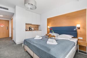 Posteľ alebo postele v izbe v ubytovaní Seaside Park Private Apartment by Noclegi Renters