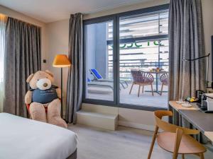 Posteľ alebo postele v izbe v ubytovaní Novotel Madrid City Las Ventas