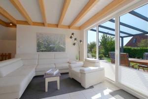 Posezení v ubytování SR Mellumplate 19