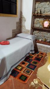 Postel nebo postele na pokoji v ubytování Agriturismo Rosso Lampone