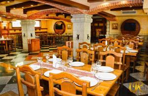 A restaurant or other place to eat at Ureni Hotel